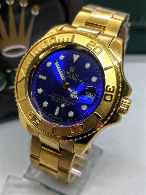 rolex dourado e azul